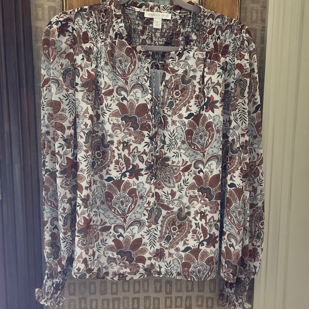 Gorgeous and flattering smocked flowing top.  Size L, Chelsea & Violet.  Colors!